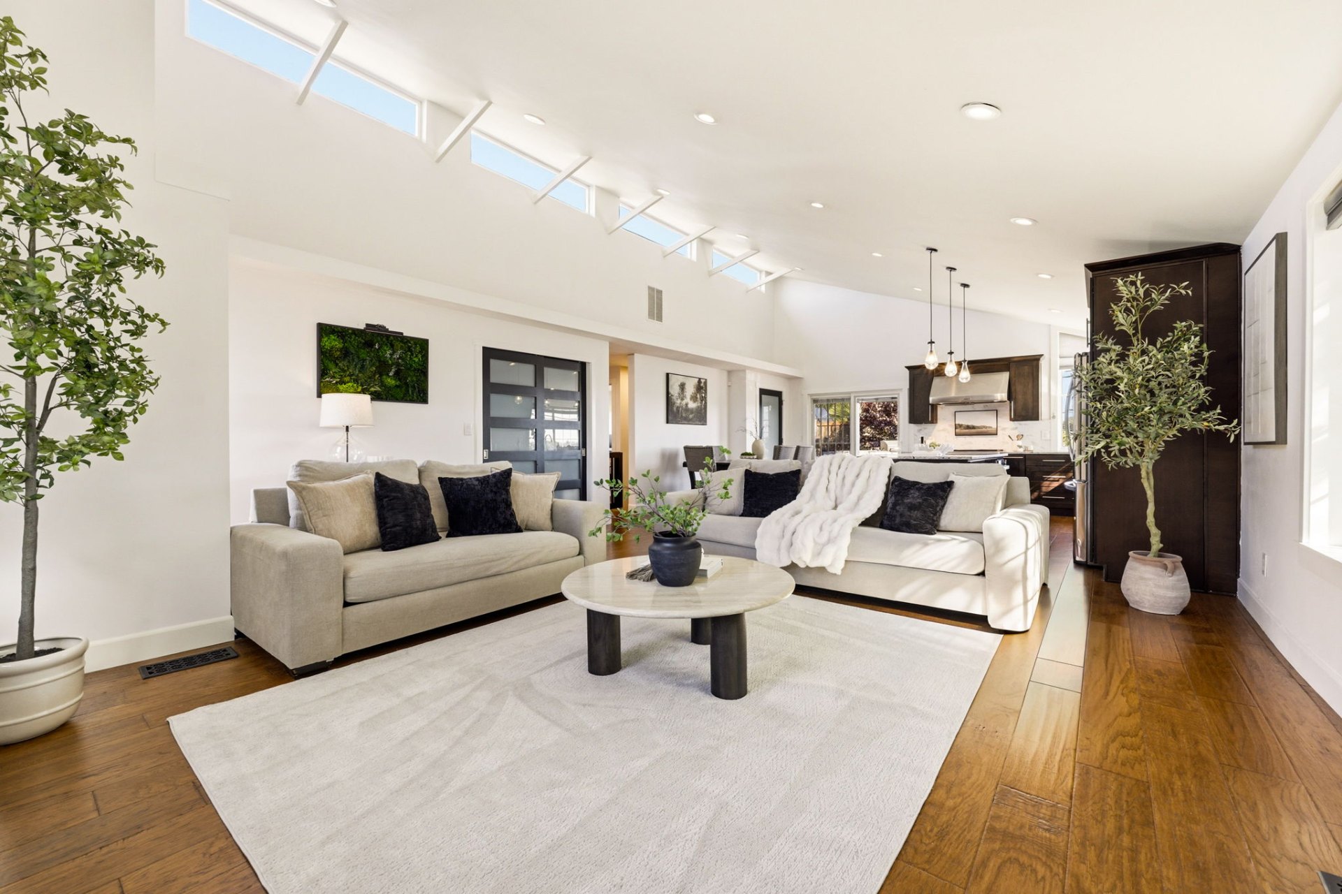 Vaulted living room with gas fireplace