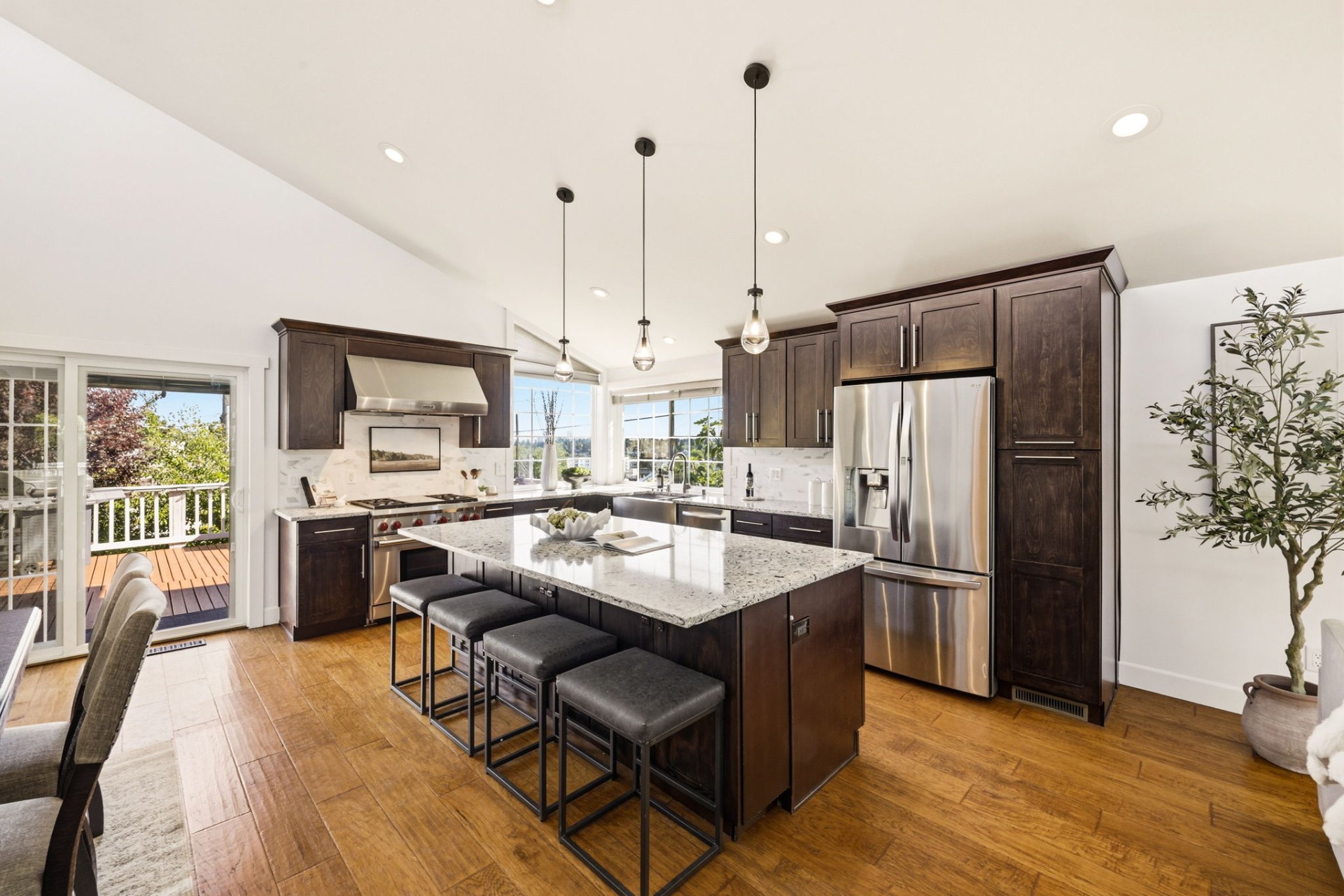 Kitchen with quartz countertops and stainless steel appliances